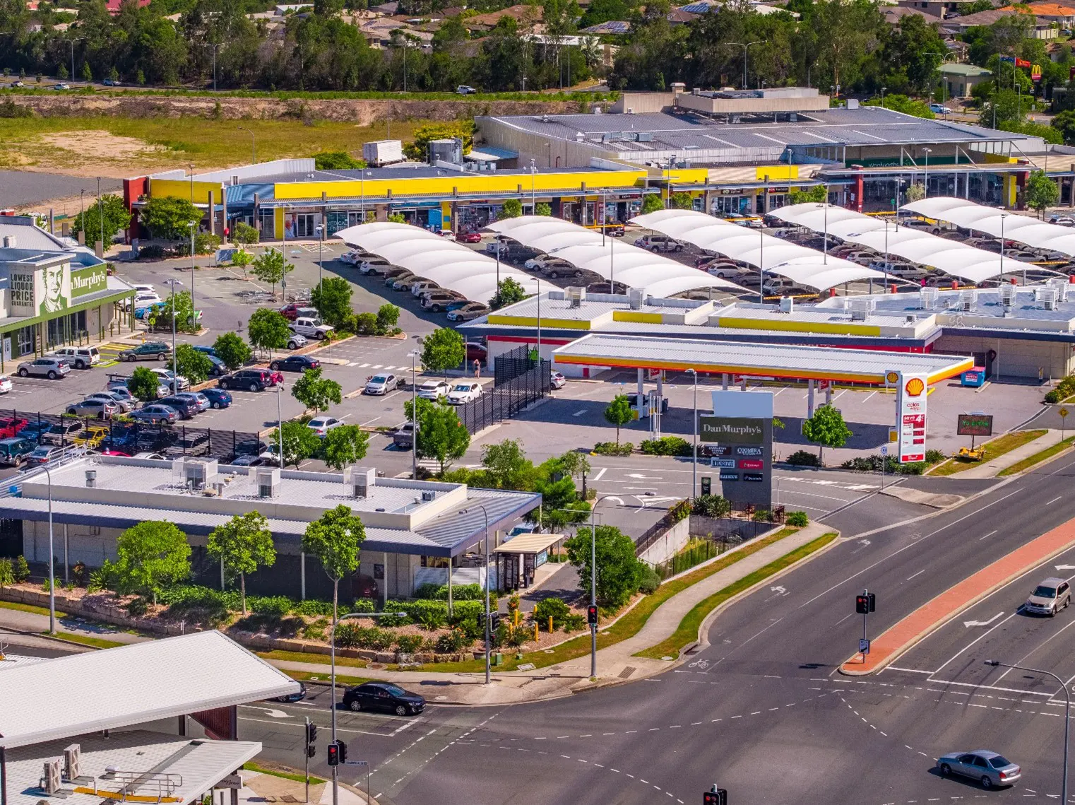 Aerial view of Coomera Square, a modern open-style essential retail located in Coomera's main retail trade precinct.